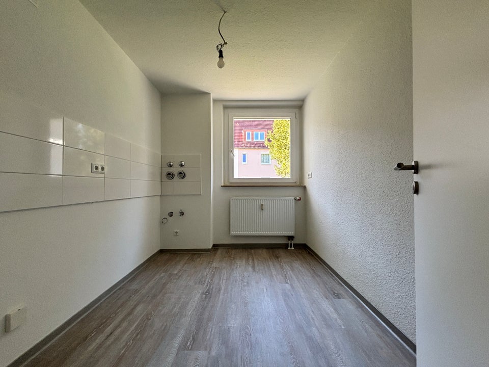 Bezugsfertige 3-Zimmer Wohnung im EG in modernisiertem Gebäude - Photo 1