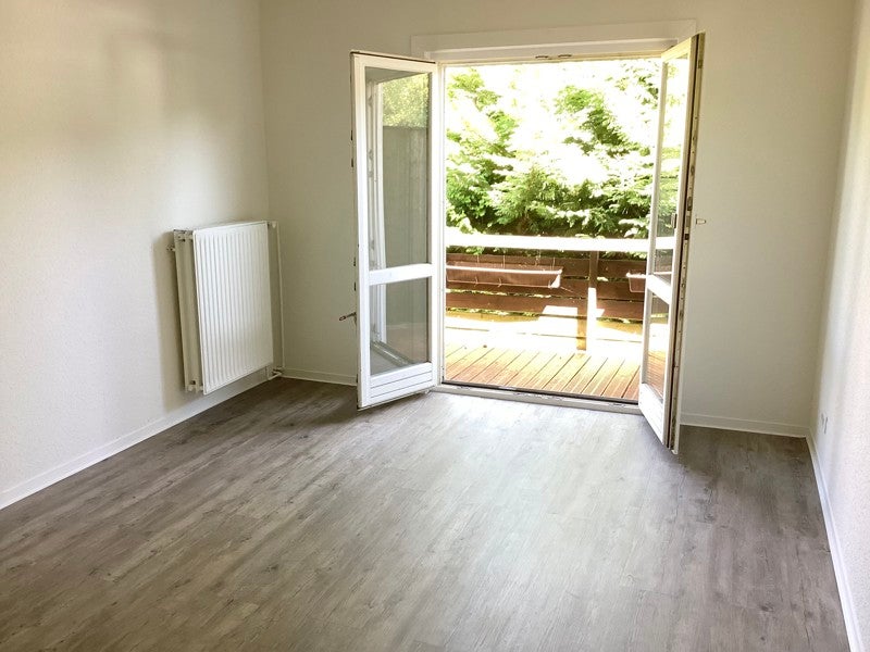 2-Zimmer-Wohnung mit Reihenhauscharakter wartet auf neue Bewohner - Foto 1