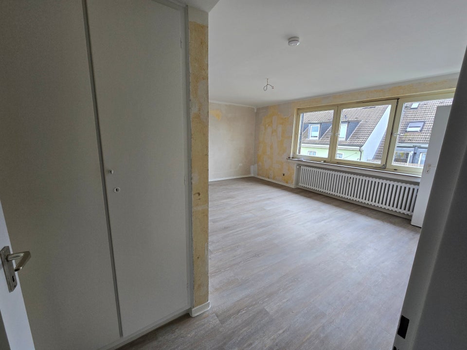 Saniertes Single-Appartment direkt in der Eller-Einkaufsstraße - Foto 1