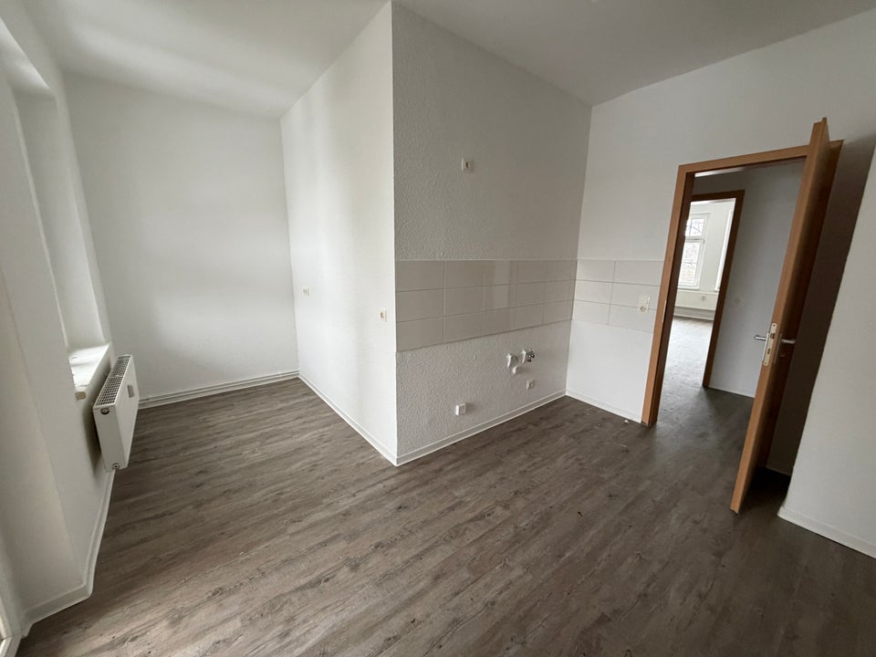 Großzügige Zwei-Zimmer-Wohnung mit Fußbodenheizung im Bad - Foto 4