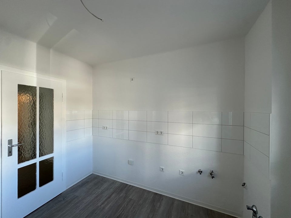 modernisierte 2-Zimmer Wohnung mit Balkon - Foto 1