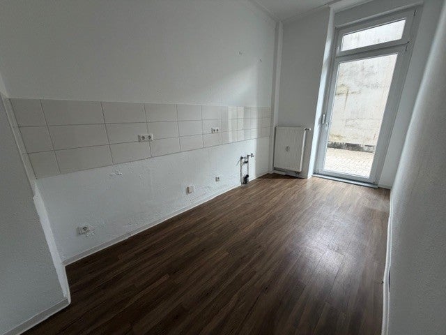Terrasse inklusive - schicke Singlewohnung mit saniertem Bad - Foto 1