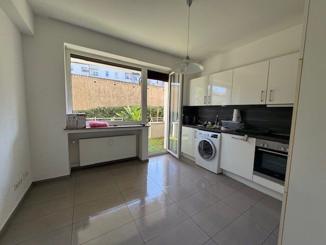 Frei zum 01.04.2026: 2-Zimmer-Wohnung mit Einbauküche und Garten - Photo 3