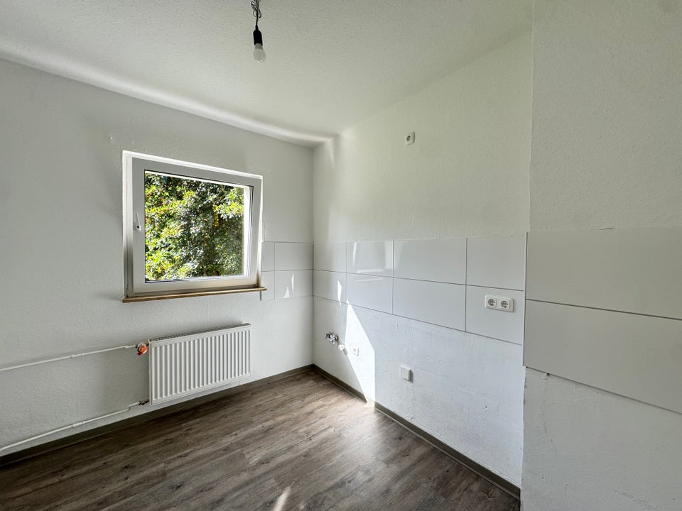 sanierte 3-Zimmer-EG-Wohnung in grüner Umgebung - Foto 3