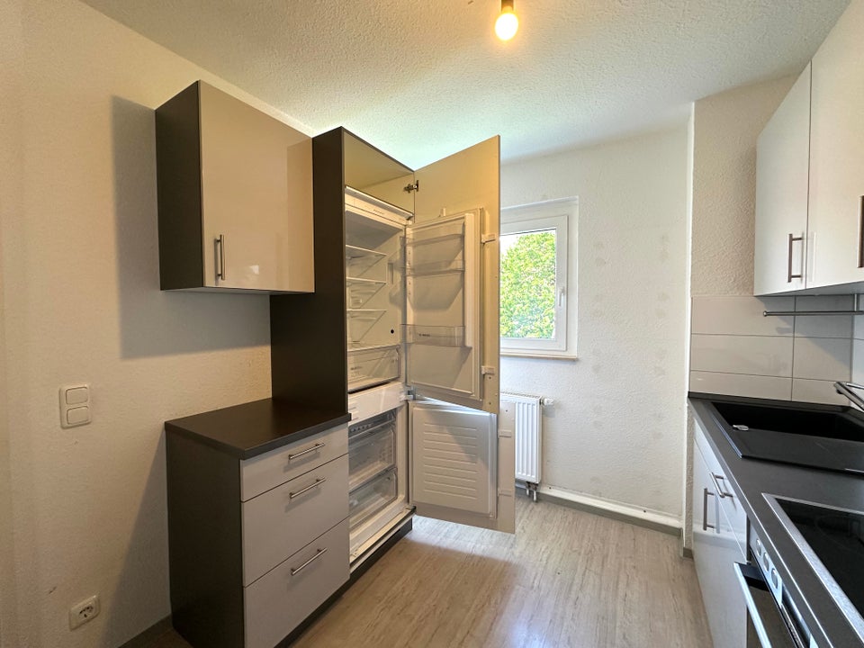 Auf zwei Ebenen: 4-Zimmer-Wohnung mit Einbauküche! - Foto 4