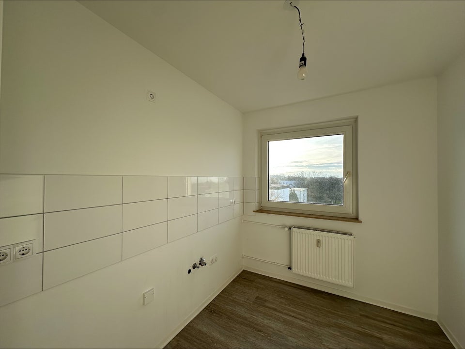 Geräumige 3-Zi.-Wohnung mit Balkon in LEV. Steinbüchel! - Photo 4