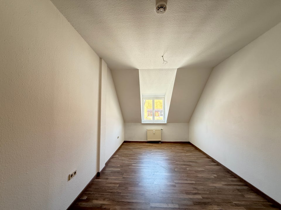 Charmante Dachgeschosswohnung in zentraler Lage! - Foto 5