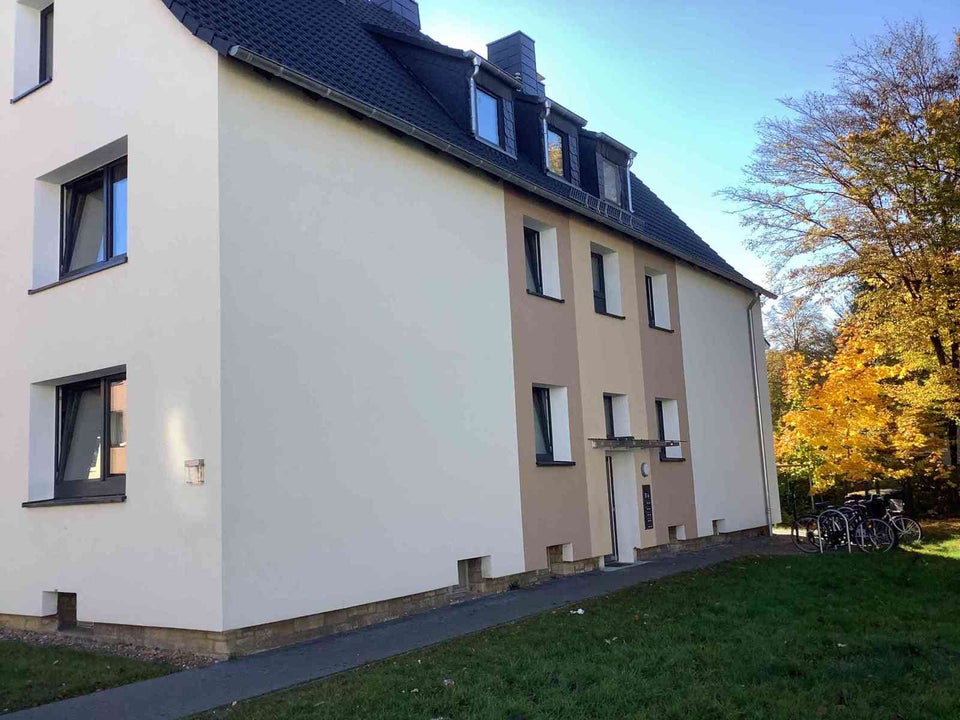 Schöne Dachgeschosswohnung in energetisch saniertem Haus! - Foto 4