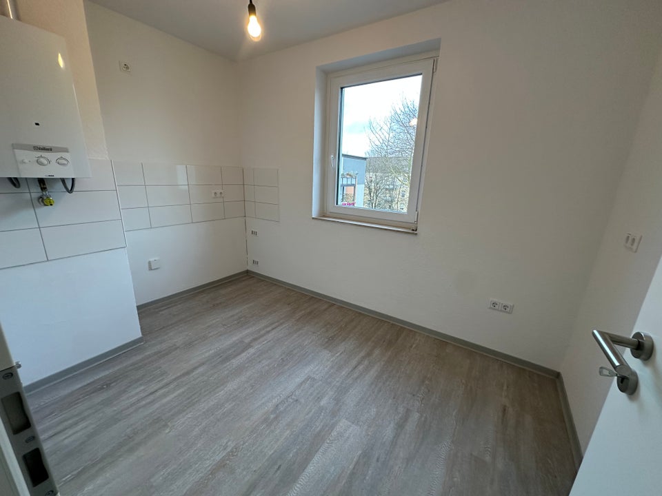 Schöner Wohnen: 3,5-Zimmer-Wohnung in zentraler Lage - Foto 2