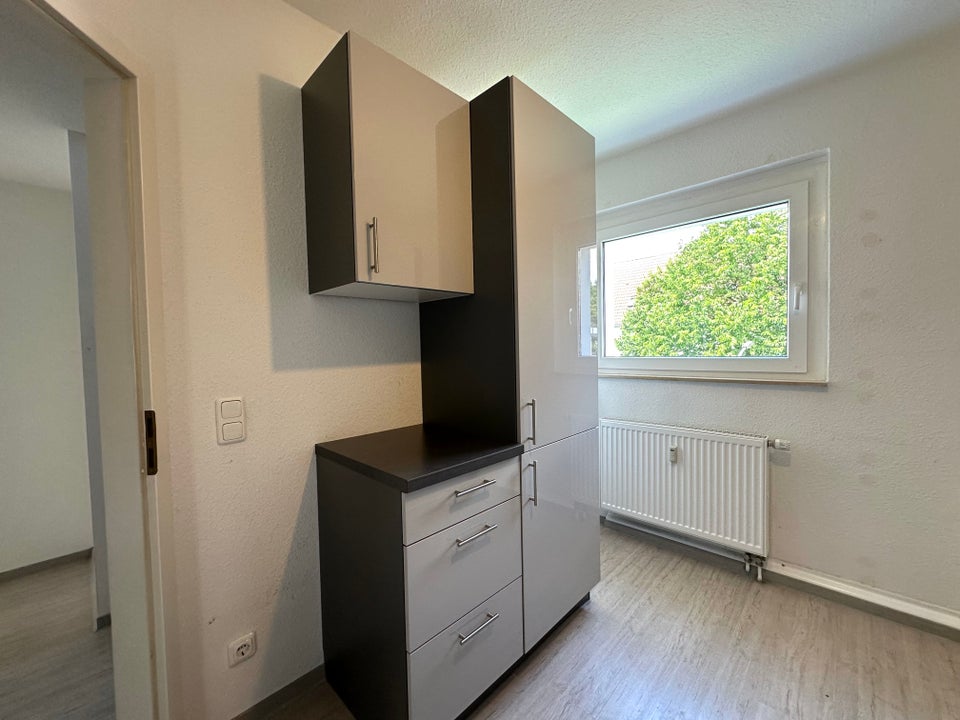 Auf zwei Ebenen: 4-Zimmer-Wohnung mit Einbauküche! - Foto 5