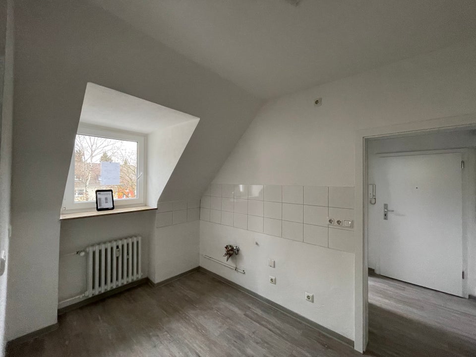 Optimale Dachgeschoßwohnung im Herzen von Dortmund-Eving - Photo 1