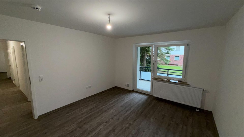 Schöne 2,5 Zimmer-Wohnung mit Balkon und Gartenanteil - Foto 1