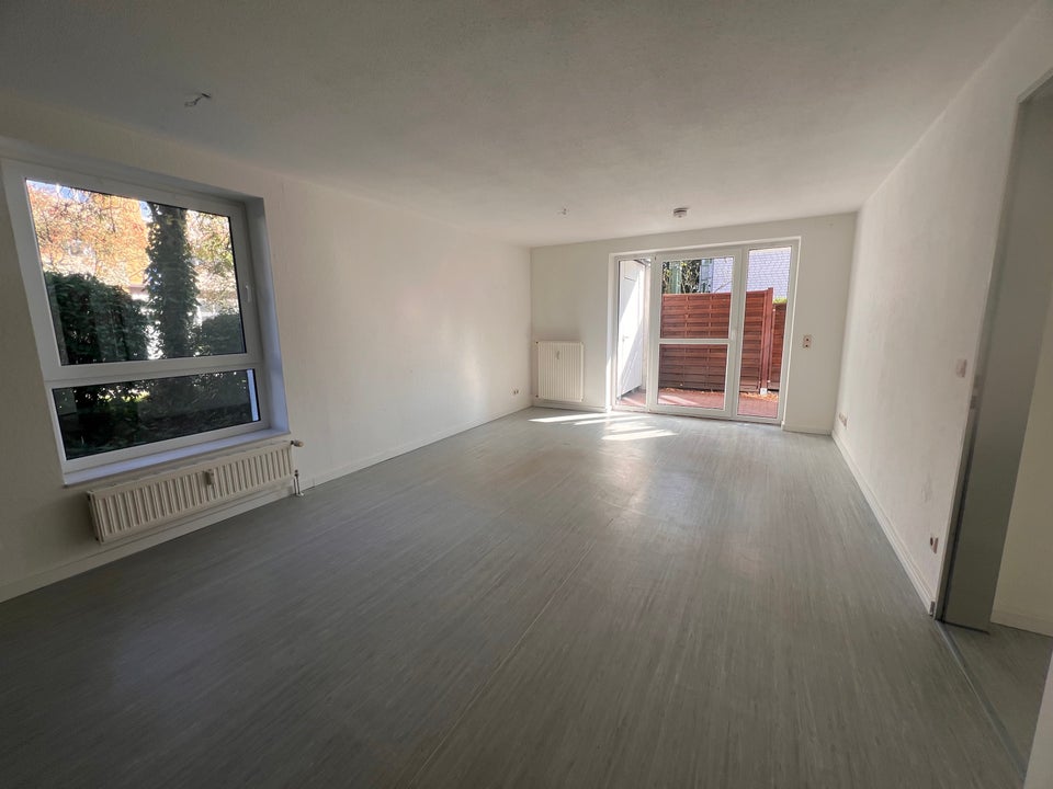 2-Zi.-Wohnung im Erdgeschoss mit kleinem Garten frei - Foto 1