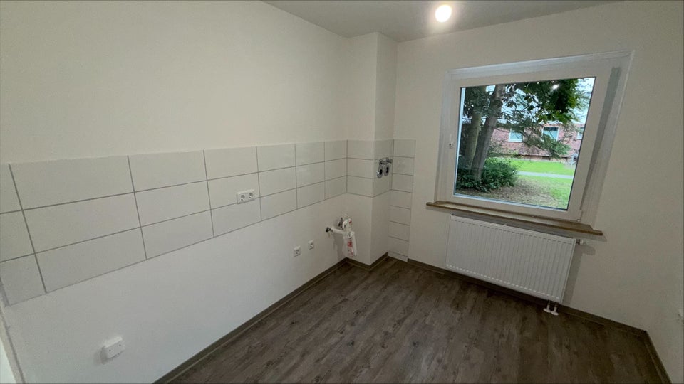 Schöne 2,5 Zimmer-Wohnung mit Balkon und Gartenanteil - Foto 2