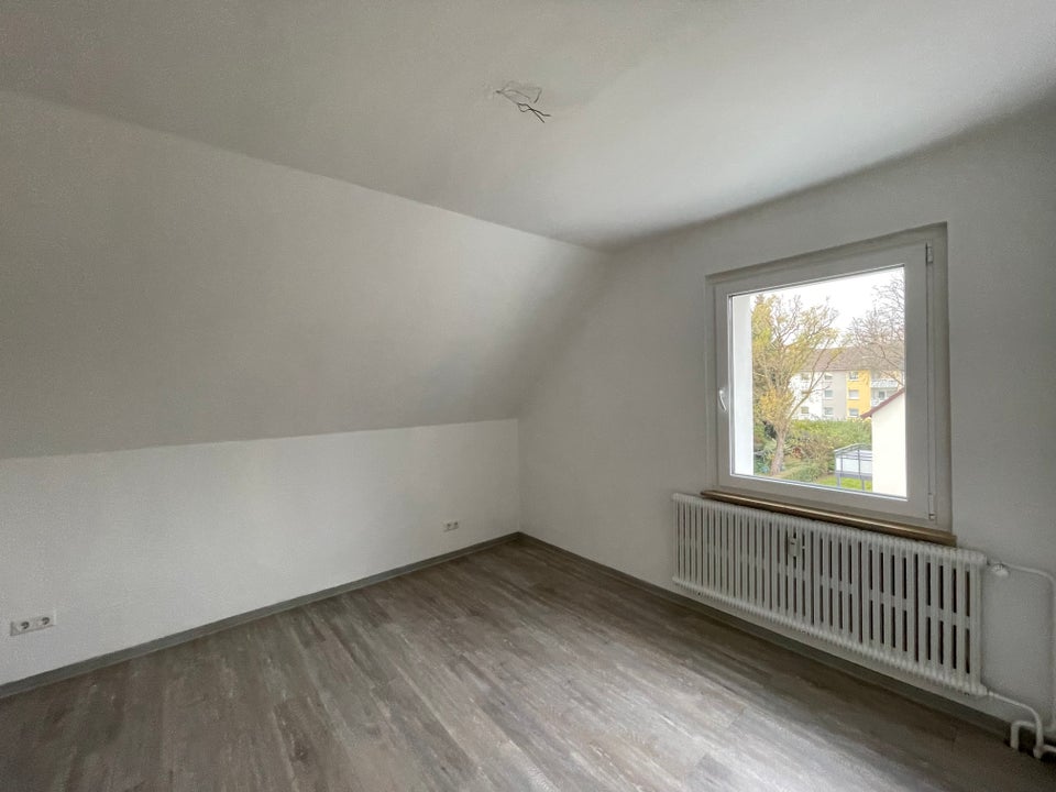 Optimale Dachgeschoßwohnung im Herzen von Dortmund-Eving - Photo 4
