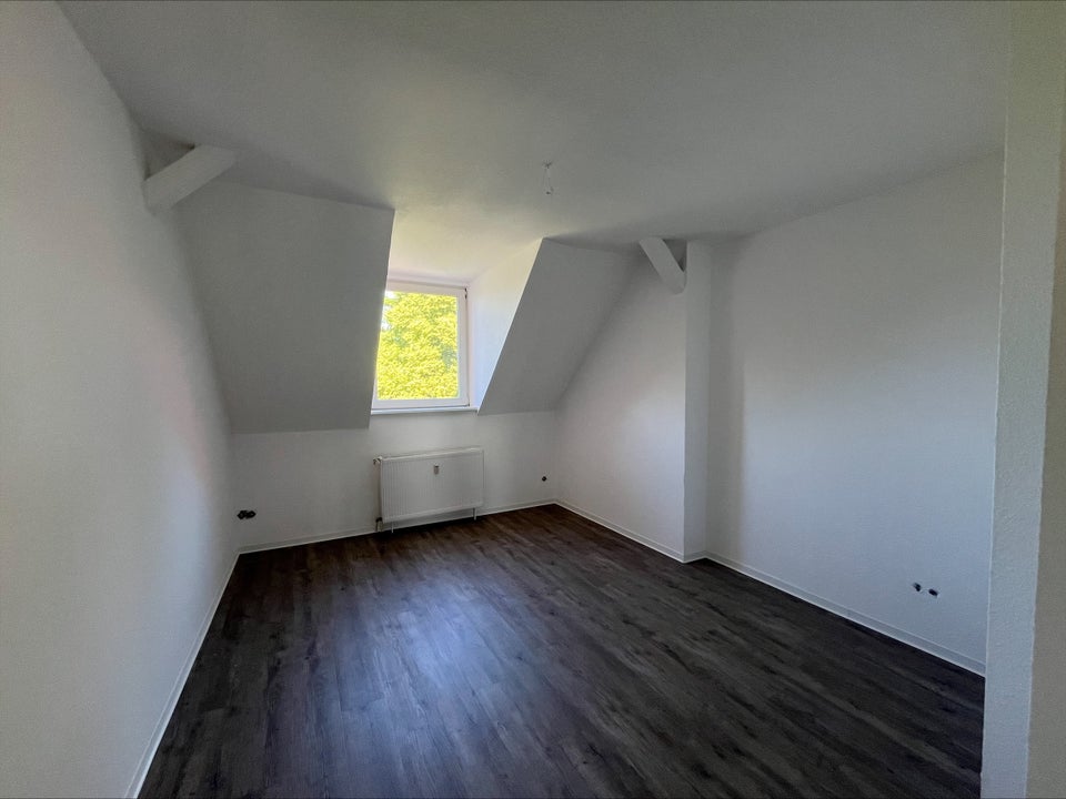 Helle und Dachgetschosswohnung - Foto 3