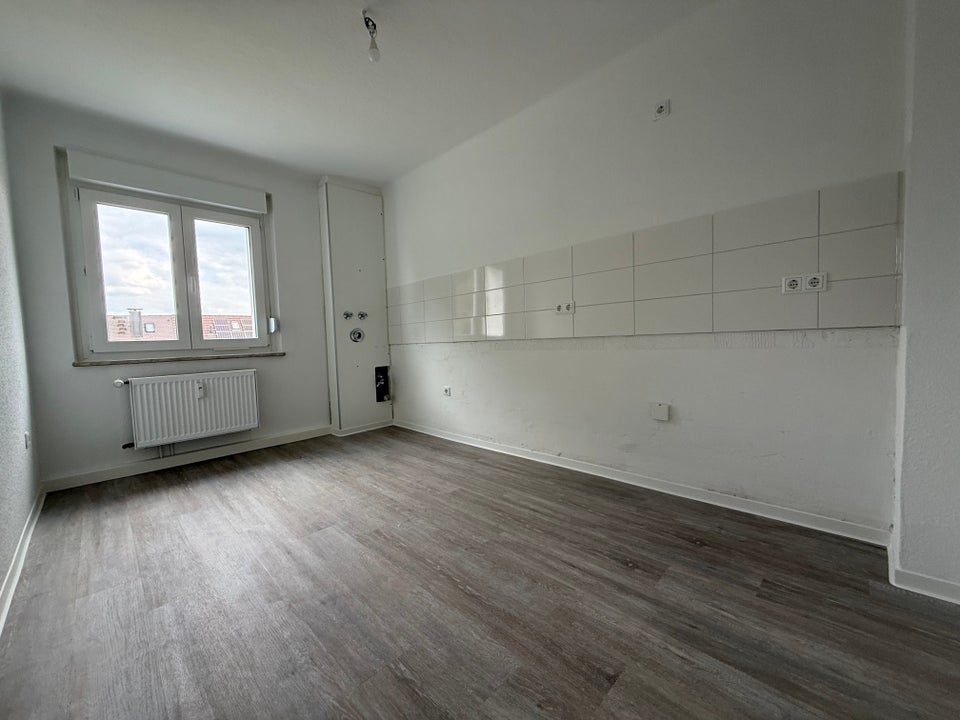 Modernisierte 2-Zimmerwohnung im 1. Obergeschoss der Friedenstraße - Foto 2