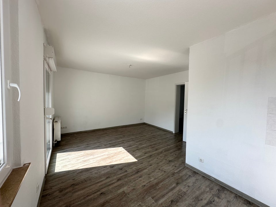 Praktische Singlewohnung mit Wannenbad und Fenster - Foto 1
