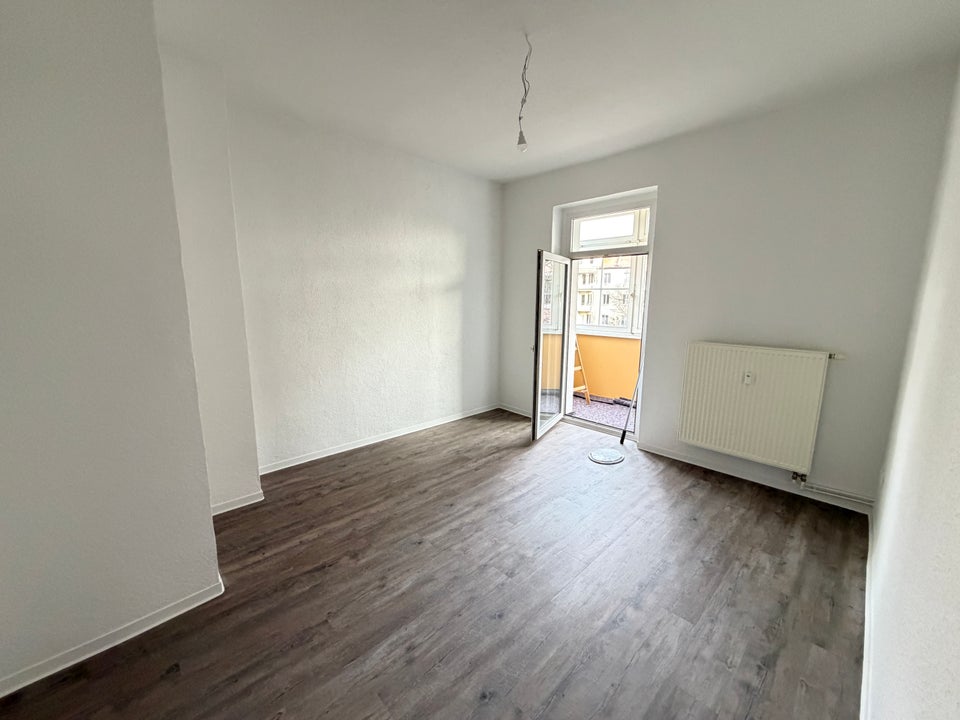 Diese schöne Zwei-Zimmer-Wohnung wurde saniert - mit Fußbodenheizung im Bad! - Foto 1