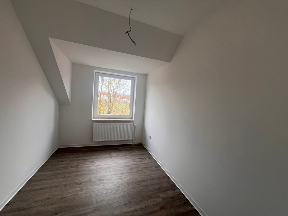 Helle 3-Zimmer-Dachgeschoss-Wohnung mit Weitblick! - Foto 1