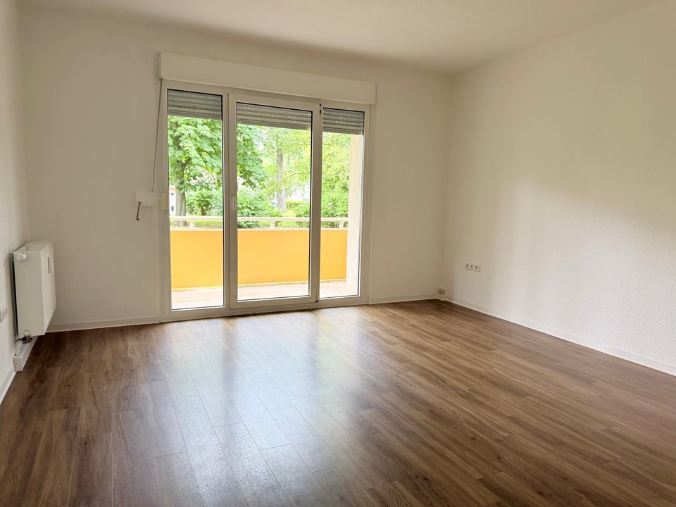 Ein Zuhause für Familien: zentral gelegen, von Grün umgeben - Photo 2