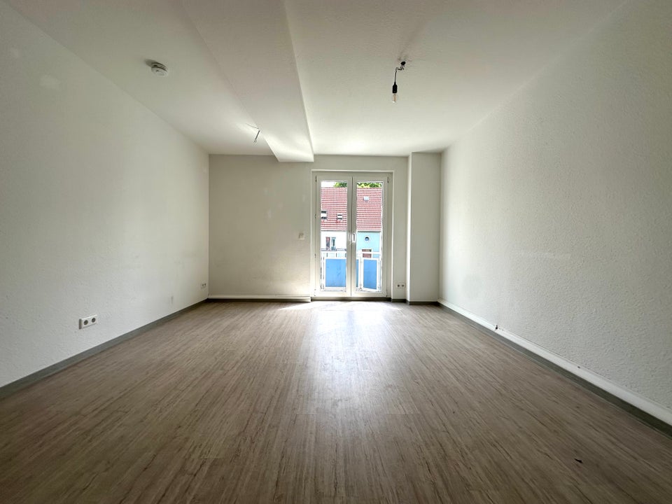 Auf zwei Ebenen: 4-Zimmer-Wohnung mit Einbauküche! - Foto 1