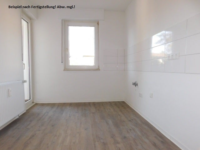 ***Top sanierte 3-Zimmer-Erdgeschosswohnung mit Balkon in ruhiger Lage*** - Photo 1