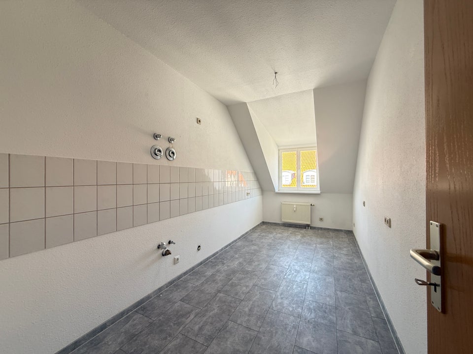 Charmante Dachgeschosswohnung in zentraler Lage! - Foto 1