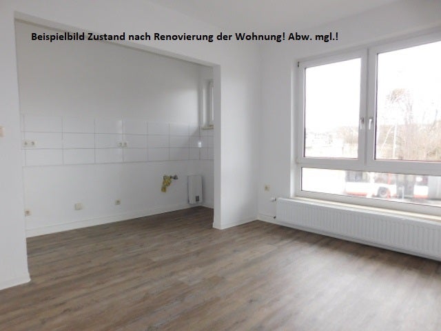 Renovierte 2-Zimmerwohnung im EG mit Laminat in zentraler Lage... - Photo 3
