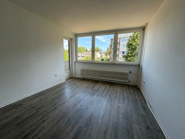 Gut aufgeteilte 2-Zimmer-Wohnung mit Balkon in grüner Lage! - Photo 1