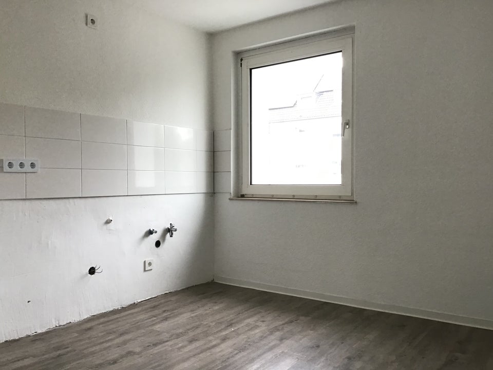 Schicke Singlewohnung mit sonnigem Balkon! - Foto 1