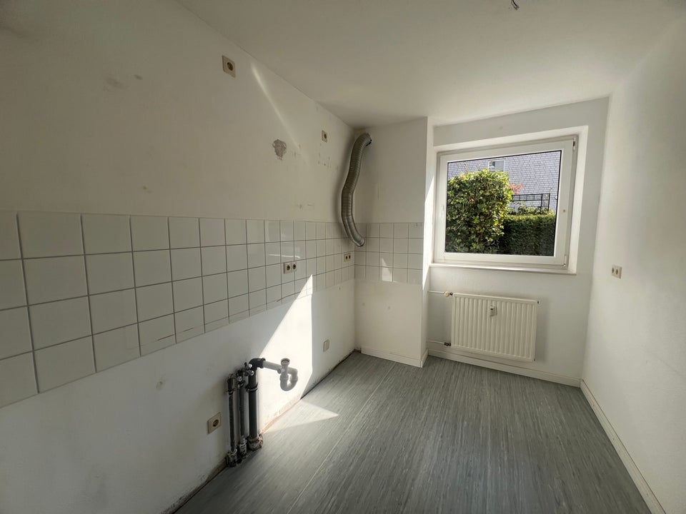 2-Zi.-Wohnung im Erdgeschoss mit kleinem Garten frei - Foto 4