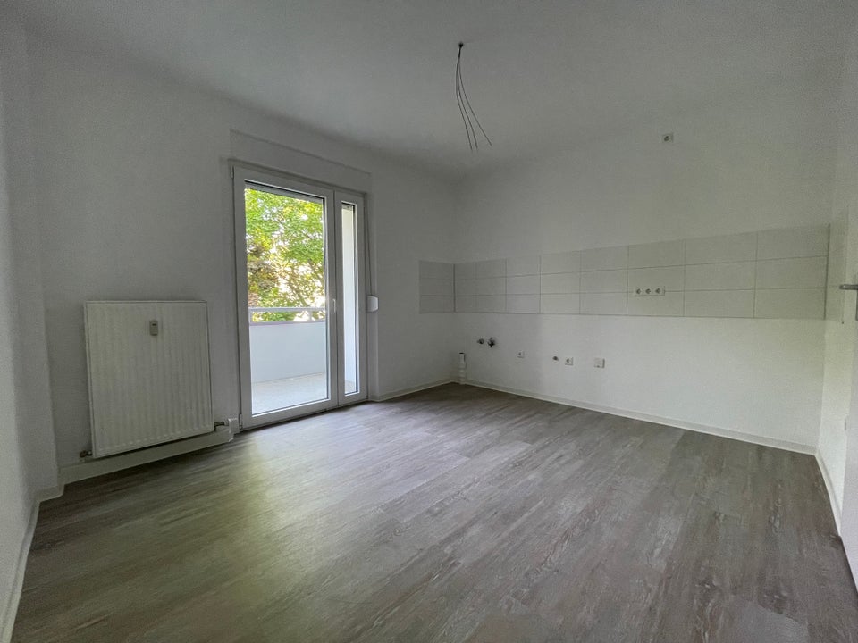 Moderne 3,5-Zimmer-Wohnung mit Balkon in zentraler Lage - Foto 5