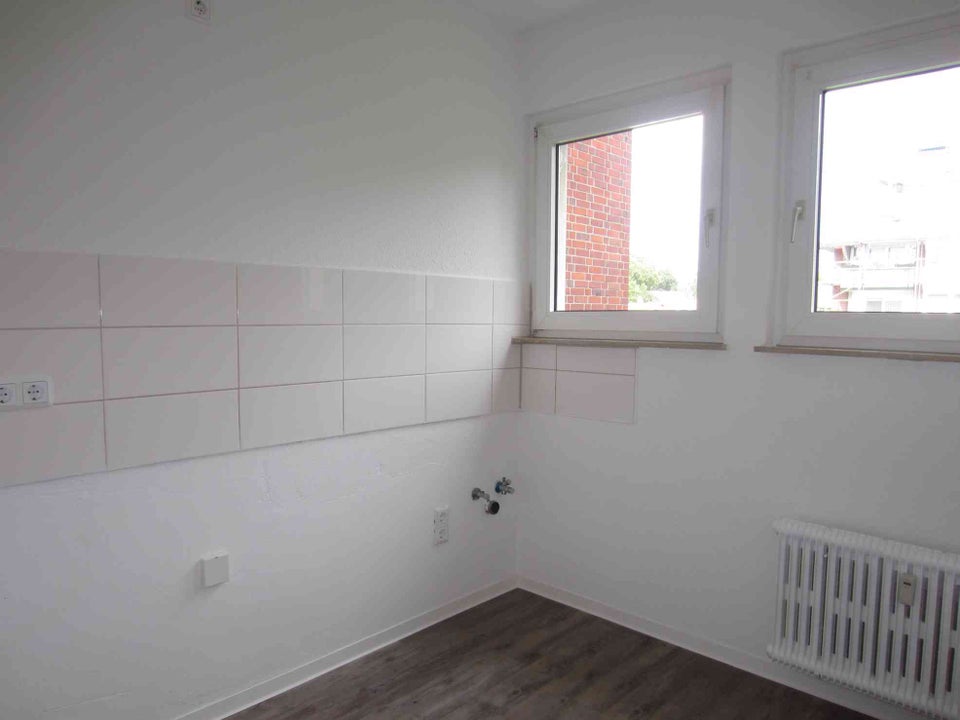 Gut aufgeteilte 2-Zimmer-Wohnung mit Balkon in grüner Lage! - Foto 3