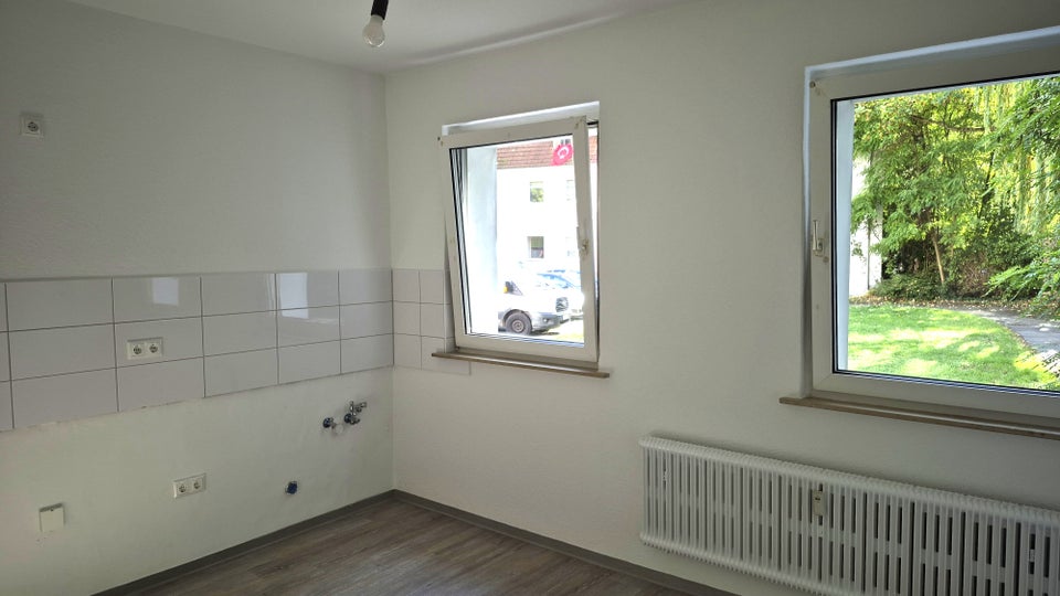 Perfekt für uns: renovierte 2-Zimmer-Wohnung im Grünen - Foto 1