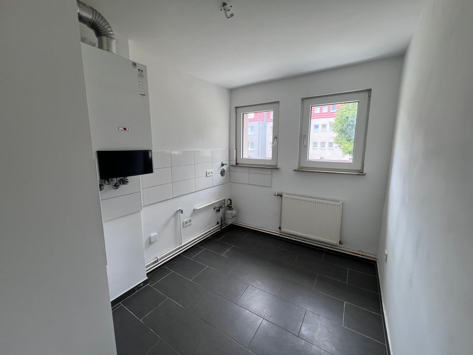 Schöne Erdgeschosswohnung mit modernem Wannenbad - Foto 4
