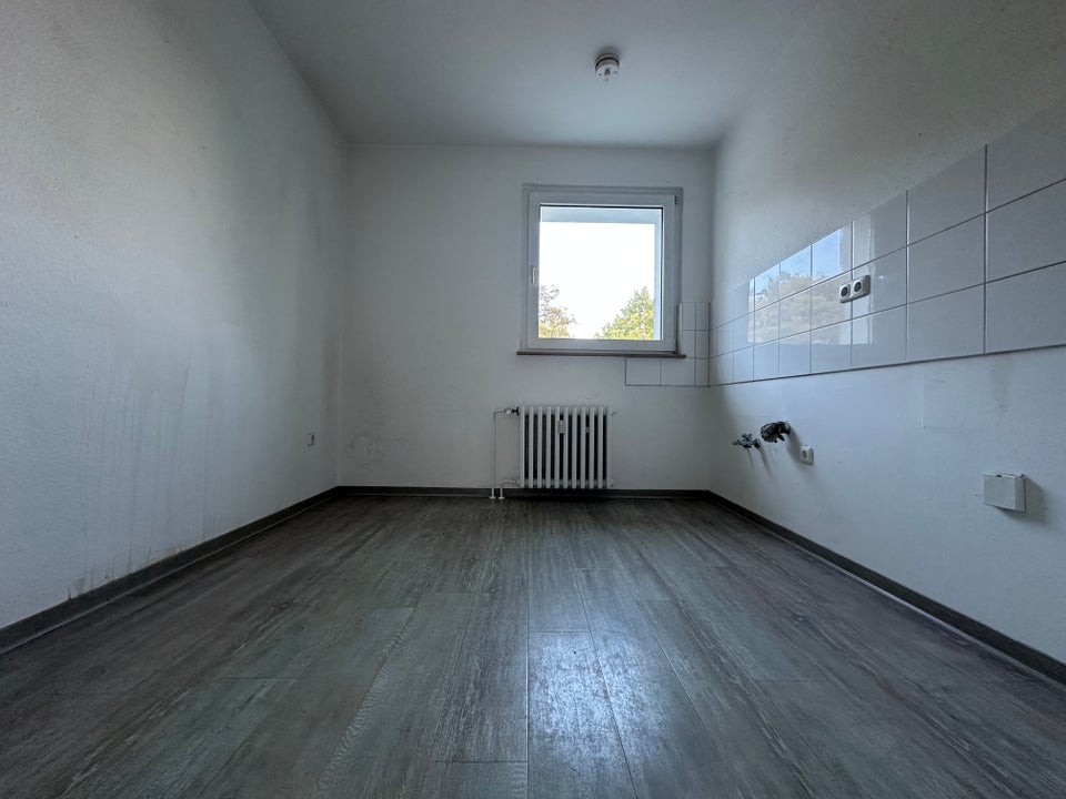 Preisgünstige, zentrale 3,5-Zimmer-Wohnung - Foto 4