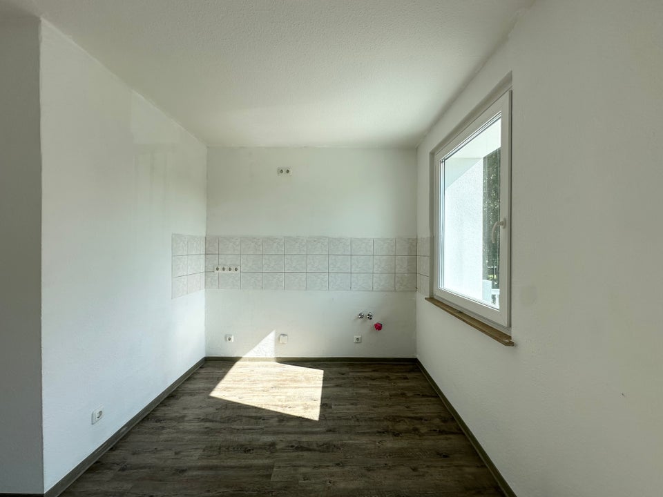 Praktische Singlewohnung mit Wannenbad und Fenster - Foto 3