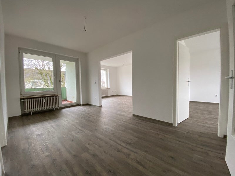 3-Zi.-Wohnung im Erdgeschoss mit Balkon - Foto 1