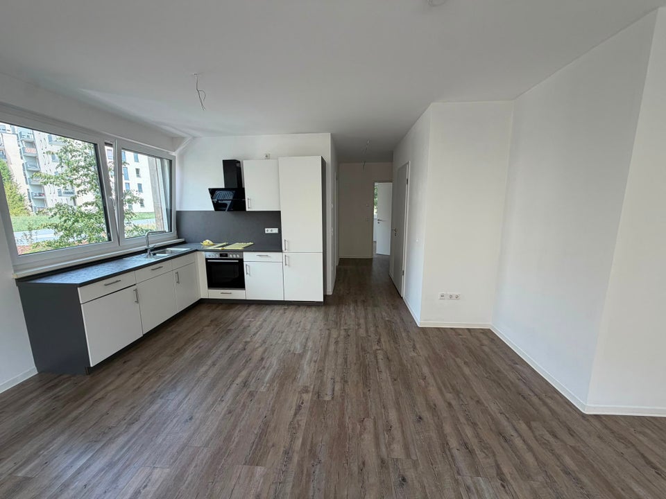 2 Zimmer-Wohnung in Toplage mit EBK und FBH - Foto 1